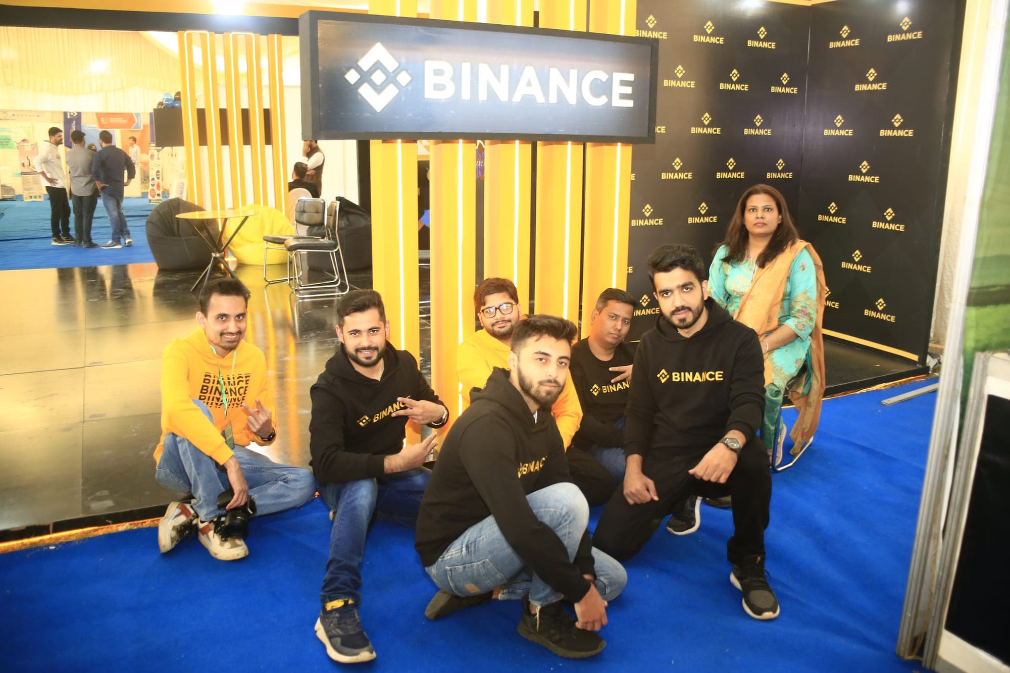 Binance team at an Exchange the World event booth