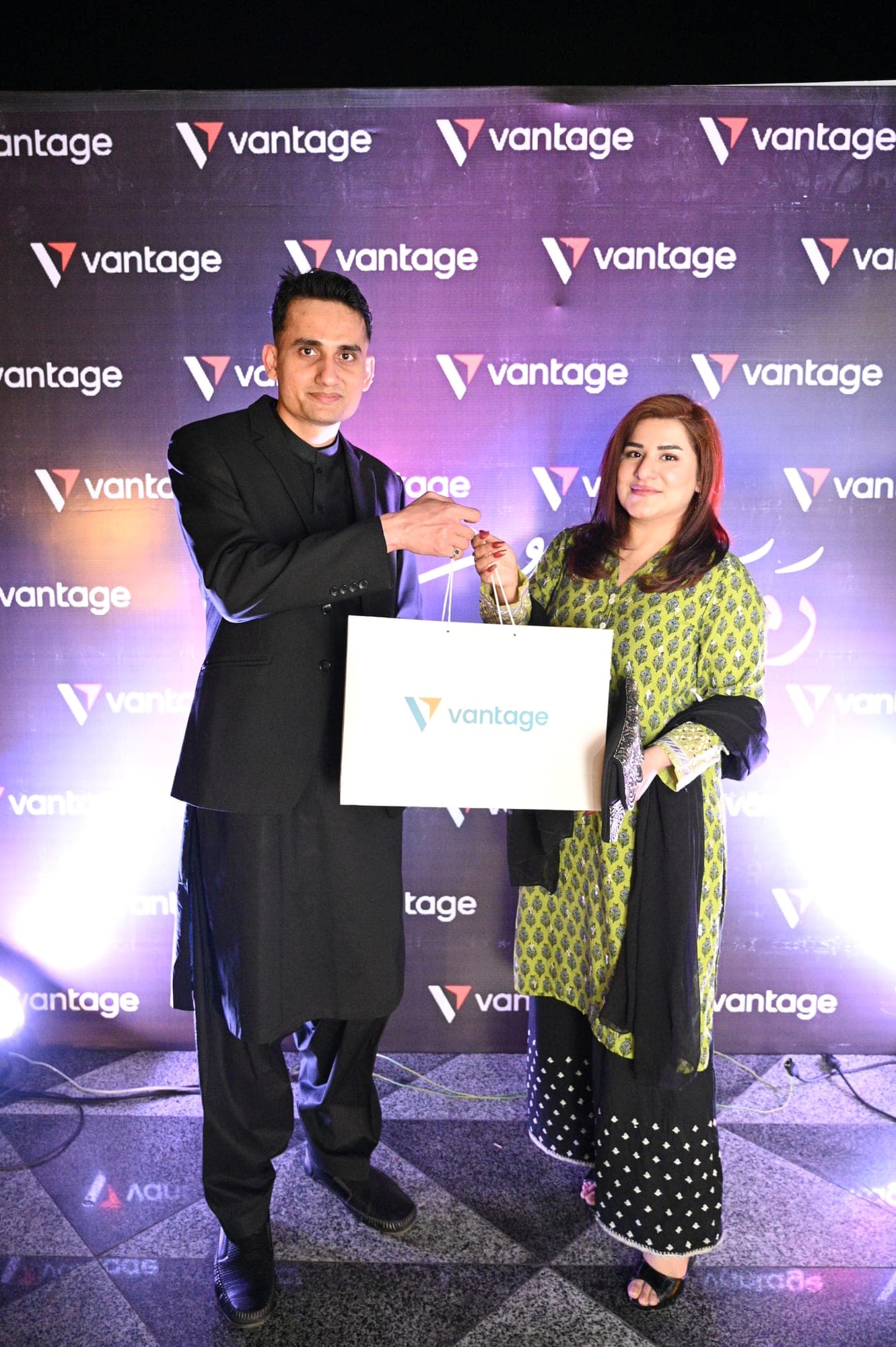 Vantage Markets brand event, host presenting on stage